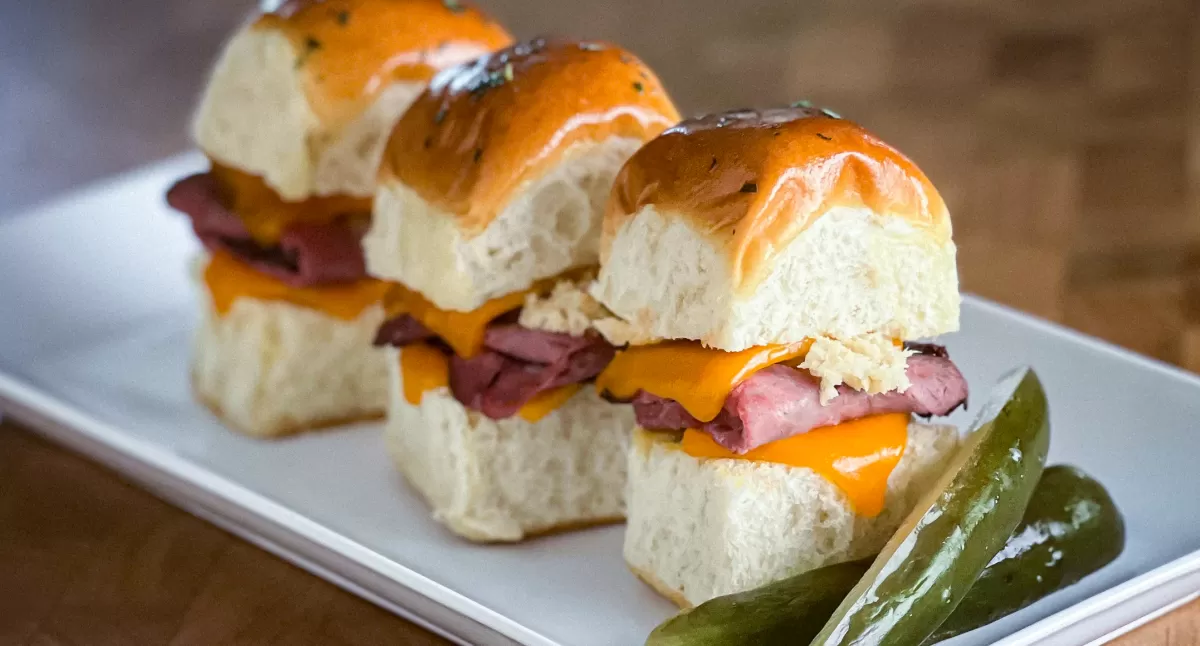 View Roast Beef & Horseradish Cheese Baked Sliders Gallery - Image 1 Roast Beef & Horseradish Cheese Baked Sliders